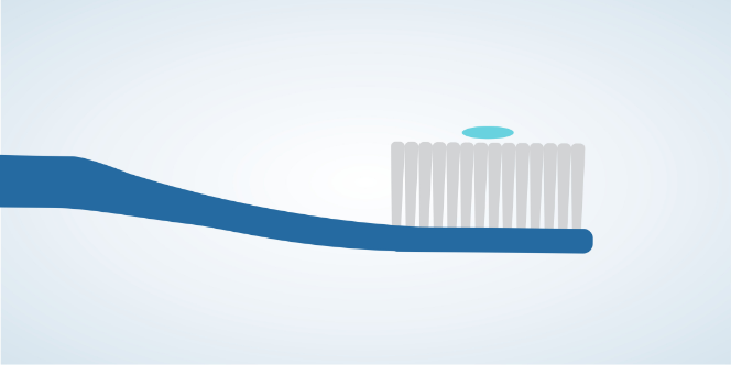 a rice size amount of toothpaste on a toothbrush.